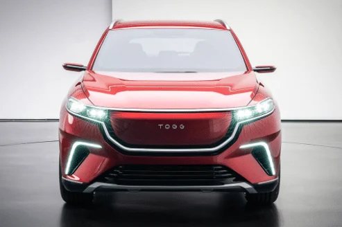 Photo of a Togg SUV, red on showroom floor