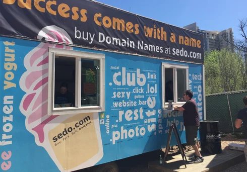 Sedo gave away free frozen yogurt with toppings named following top level domains.