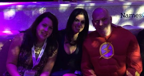 Amanda Waltz (Igloo) and Tracy Fogarty (eNaming) admire Alan Dunn's (NameCorp) fresh hairdo. He shaved his head to raise money for The Water School.