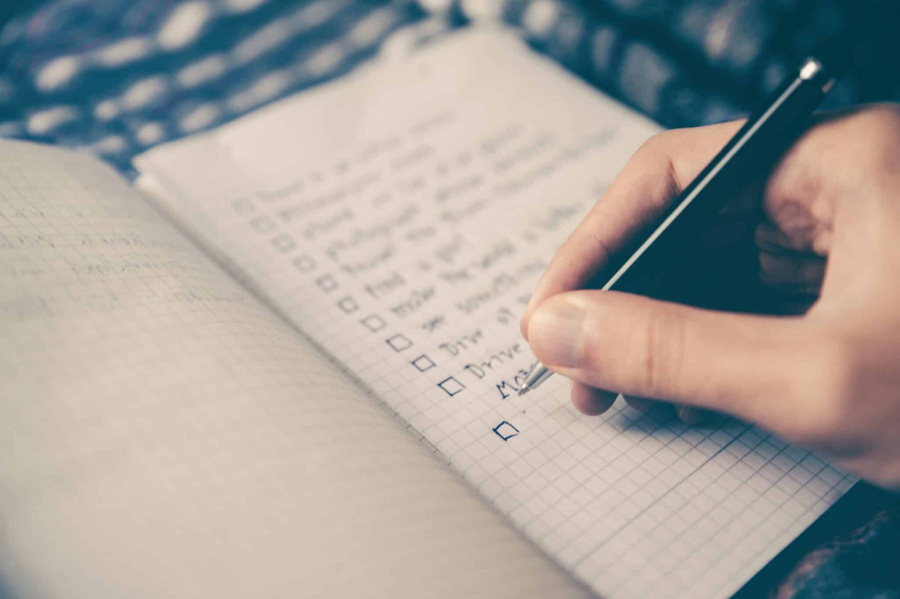 A person adding items to a "to do list"