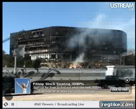 USTREAM Ad Overlay Insensitivity USTREAM video of a crash site with an overlay ad promoting a penny stock and claiming 'Jump for joy! You just made 3,000!', demonstrating extreme contextual insensitivity.
