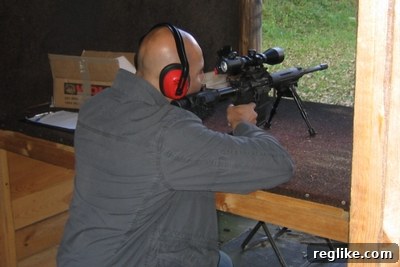 Ammar Kubba's Sniper Shot Precision Ammar Kubba expertly aiming a sniper rifle at the shooting range