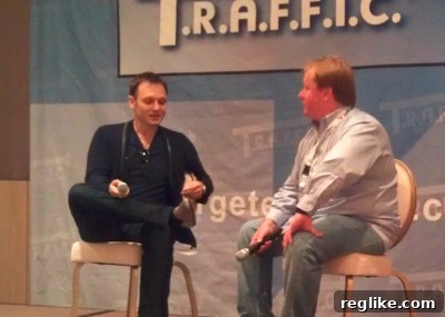 Domain Conference Speakers Two domain experts on stage at a conference