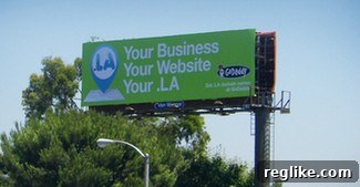 GoDaddy's Offline Drive for .LA in LA 2 GoDaddy .LA billboard in Los Angeles, a prime example of effective domain advertising strategy