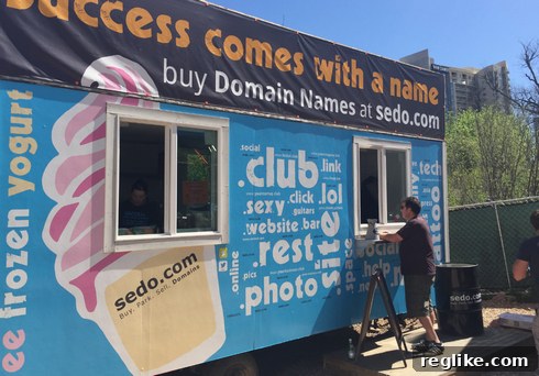Sedo gave away free frozen yogurt with toppings named after top level domains.