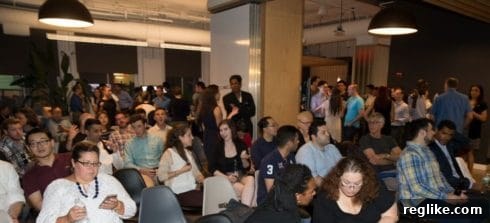 Attendees networking at the Silicon NYC launch event, showcasing a diverse crowd of tech enthusiasts.