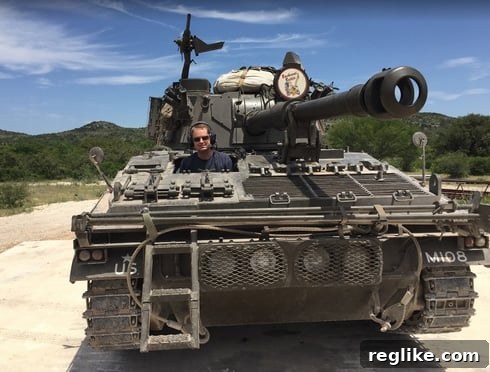 Brent Oxley HostGator Domains Tanks Unexpected Passions 3 A person driving a tank through a muddy course at Ox Ranch