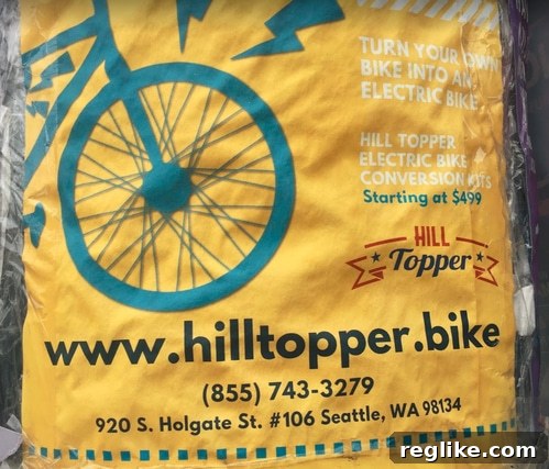 An ad for HillTopper.bike promoting an electric bicycle conversion kit.