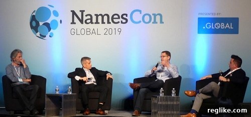 NamesCon Wraps Up 2 Experts discussing .com pricing strategies at NamesCon conference.