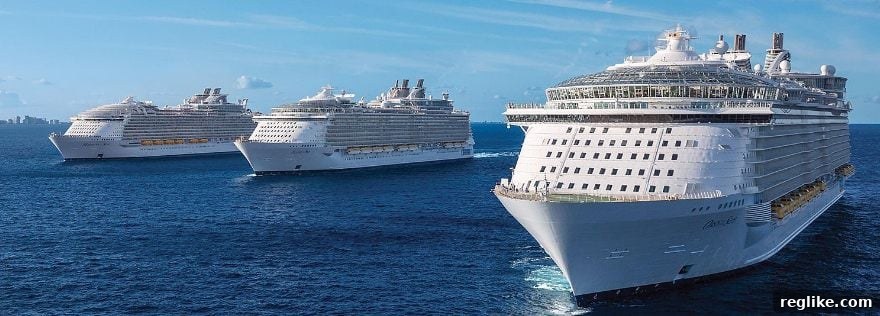 James Booth Retains RCC.com as Royal Caribbean Loses UDRP 2 Picture of three Royal Caribbean cruise ships on the ocean with a cityscape in the back