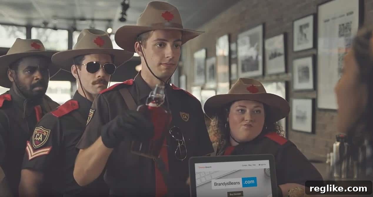 New .Ca Domain Ads Invite Canadians Home Online 2 Still screen from CIRA ad for .CA domains shows four Canadian mounties with one of them pouring syrup on a person's laptop who is registering a .com domain