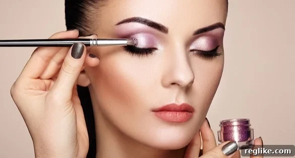 LOreal Divests Four TLDs to XYZ 2 Picture of woman applying eye shadow