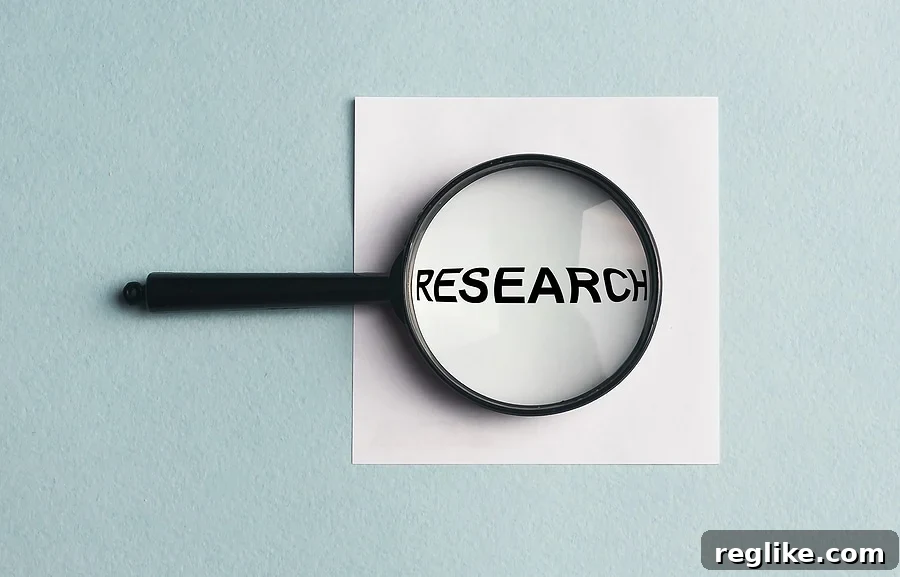 Own Your Investments: Knowledge and Diligence 2 Image of a magnifying glass with the word 'research'