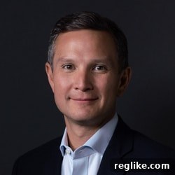GoDaddy Lands Million New Customers Amid COO Departure 2 Headshot photo of Andrew Low Ah Kee