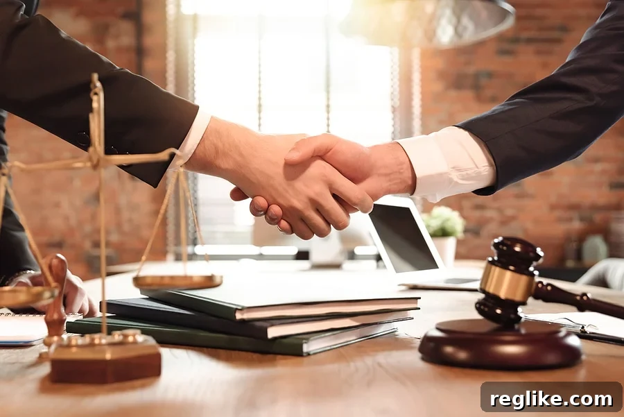 Beyond general practice, demand a legal specialist. 2 Picture of a lawyer and his client shaking hands with scales and a judge gavel in the foreground.
