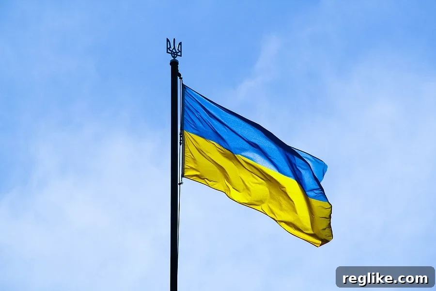 Digital Resilience: The Domain Ecosystem's Response to Russia's Invasion of Ukraine 2 Ukrainian flag, vibrant blue and yellow, waving against a clear sky, symbolizing national identity and resilience amidst conflict.
