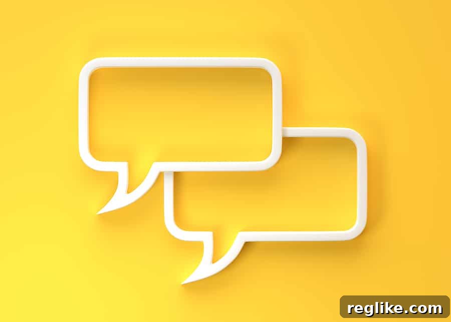 Two white speech bubbles on a yellow background symbolizing communication and feedback