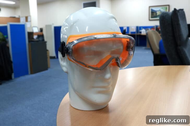 Picture of oversized motorcycle goggles on mannequin's head