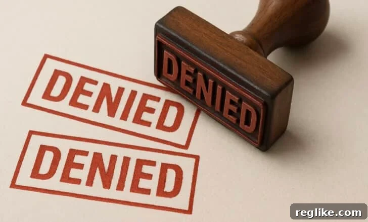 Rubber stamp with the words "Denied" stamped twice