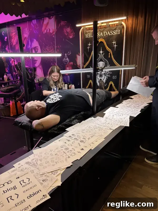Nordic Domain Days 2026 Highlights and Key Takeaways 4 Person getting tattoo